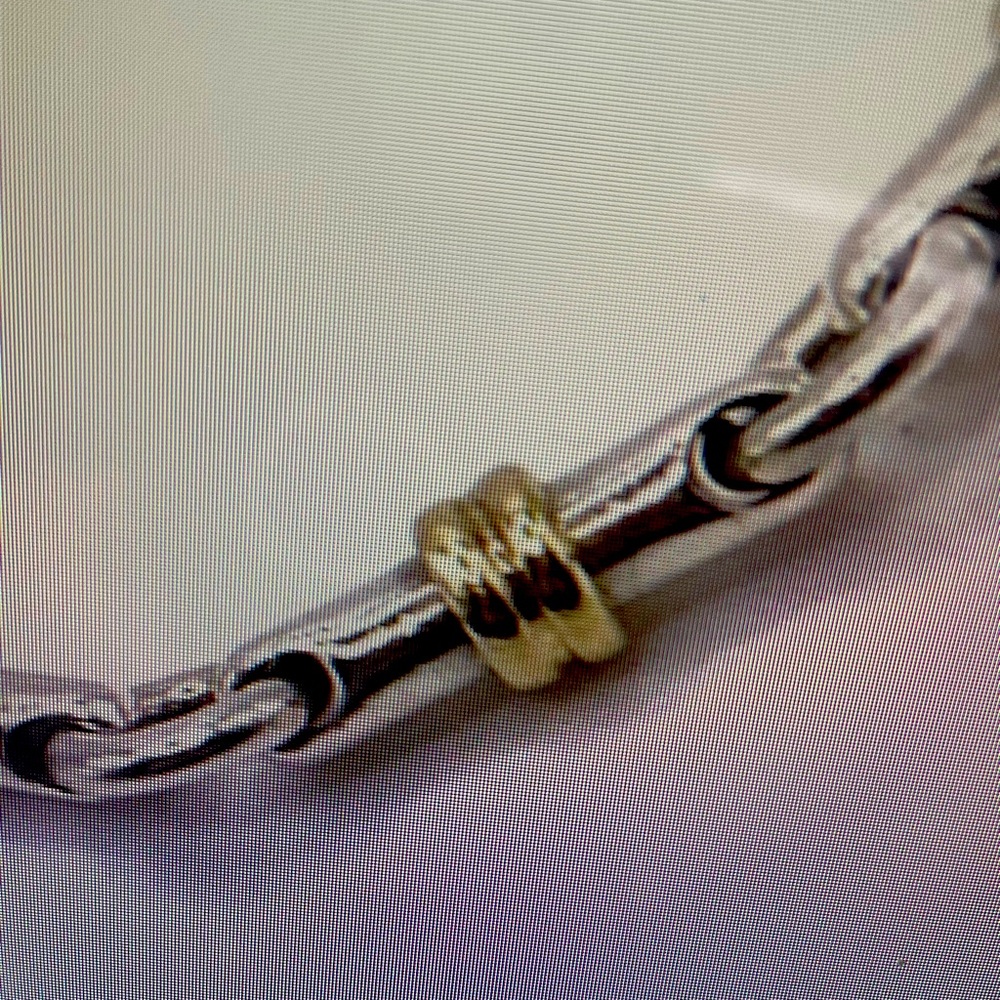 Pre-owned authentic Tiffany & Co. 18 karat two toned bracelet.